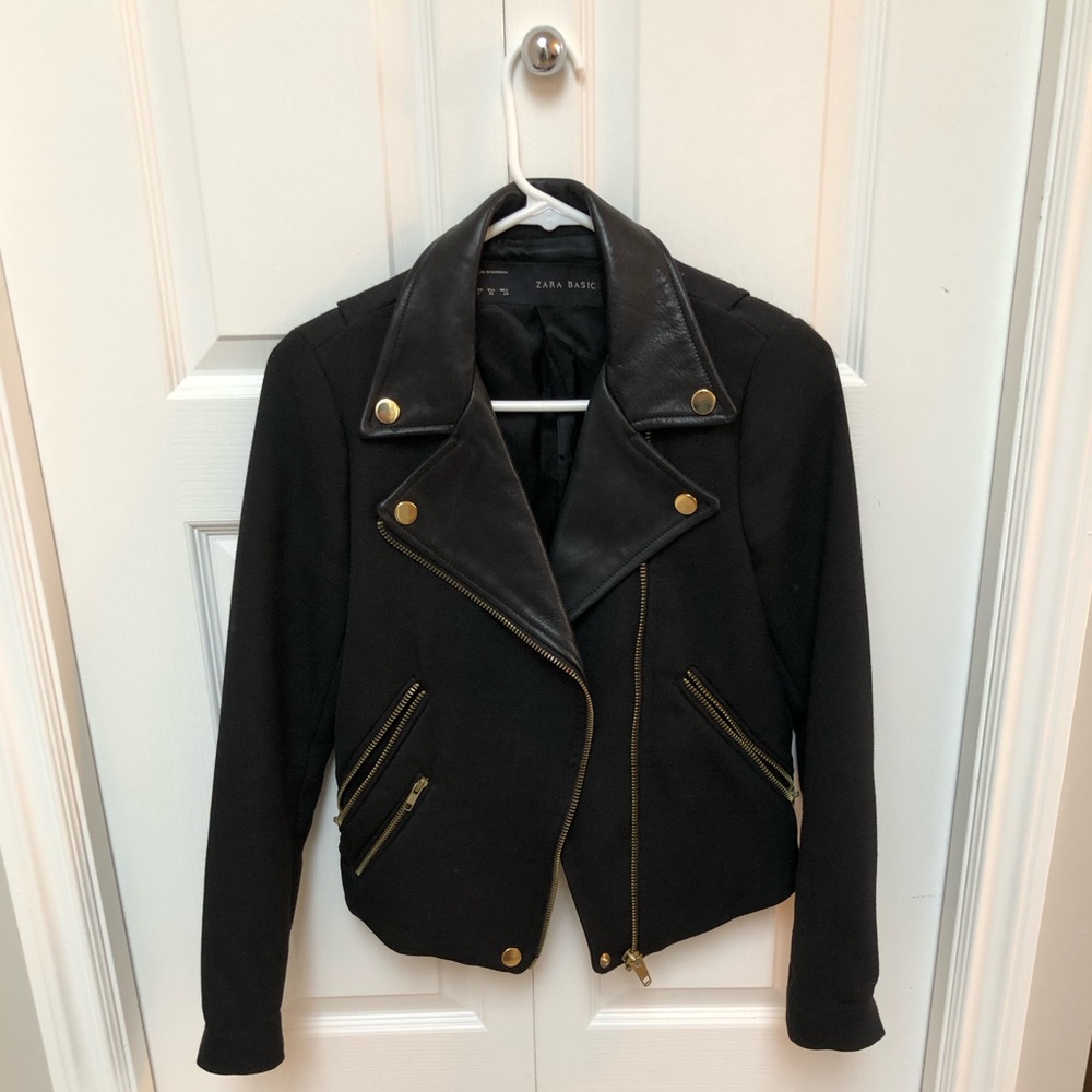 Biker style jacket with leather lapels.